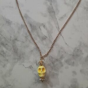 Gold Plated Yellow Ceramic Skull Pendant Necklace